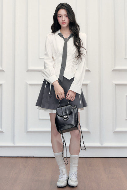 Ensemble blouse à nœud coulissant et jupe