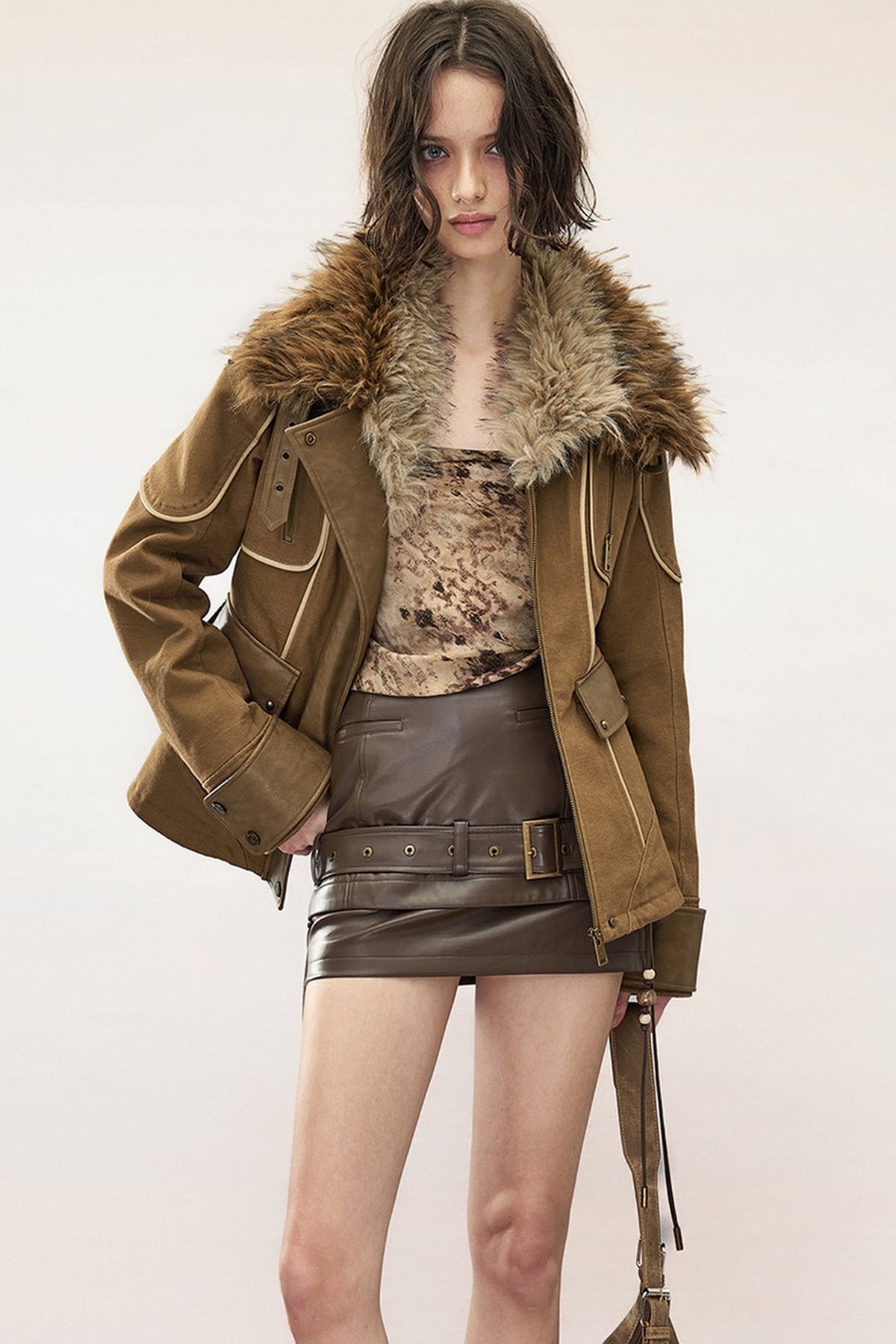 Gesteppte Baumwolljacke im Patchwork-Stil mit Lederapplikation
