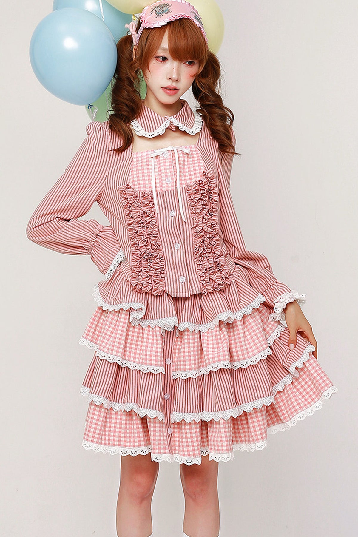 Rosa gestreiftes langärmeliges Strickhemd