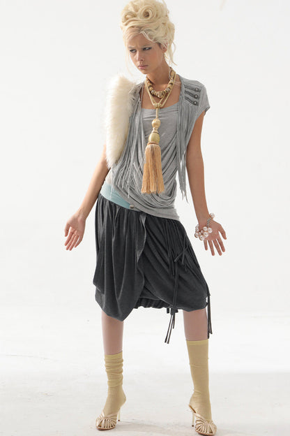 Top in maglia drappeggiato con nappine