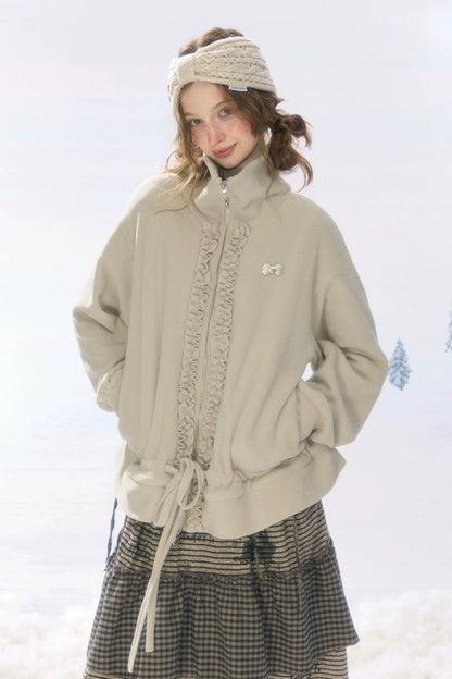 Veste en polaire grise et abricot à fermeture zippée et cordon de serrage