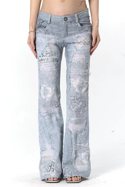 Jeans in mesh leopardato slavato a doppio strato