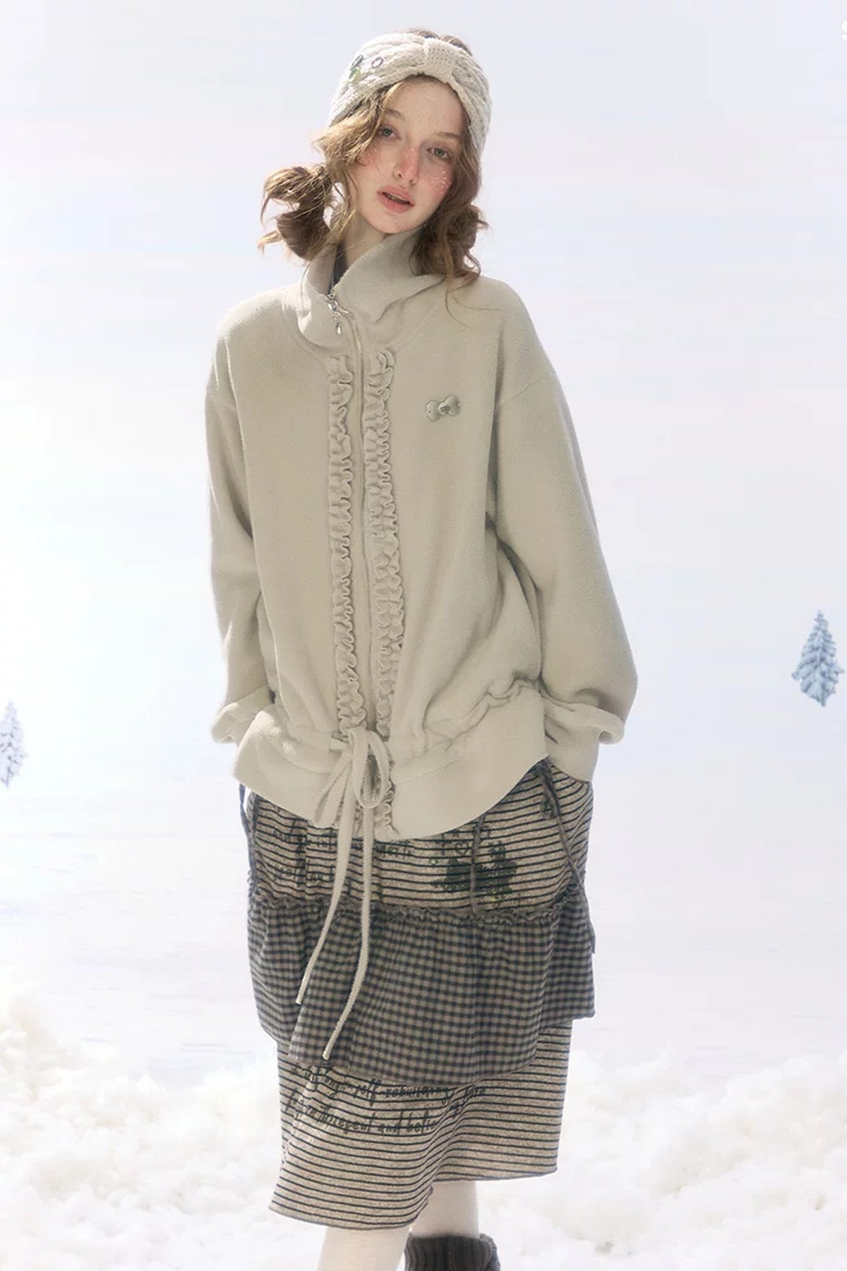 Veste en polaire grise et abricot à fermeture zippée et cordon de serrage