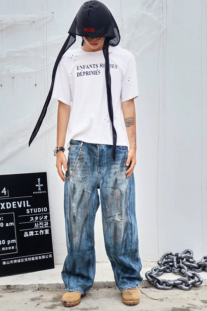 Mud-Dyed Scimitar Distressed Jeans