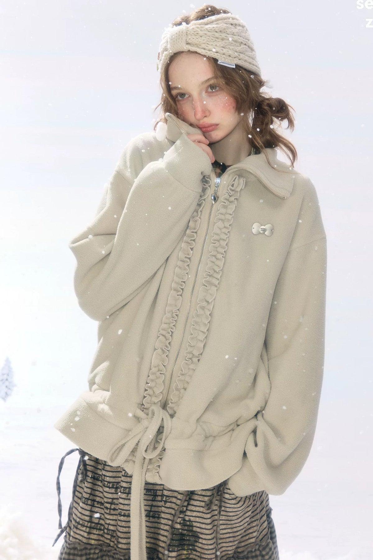Veste en polaire grise et abricot à fermeture zippée et cordon de serrage