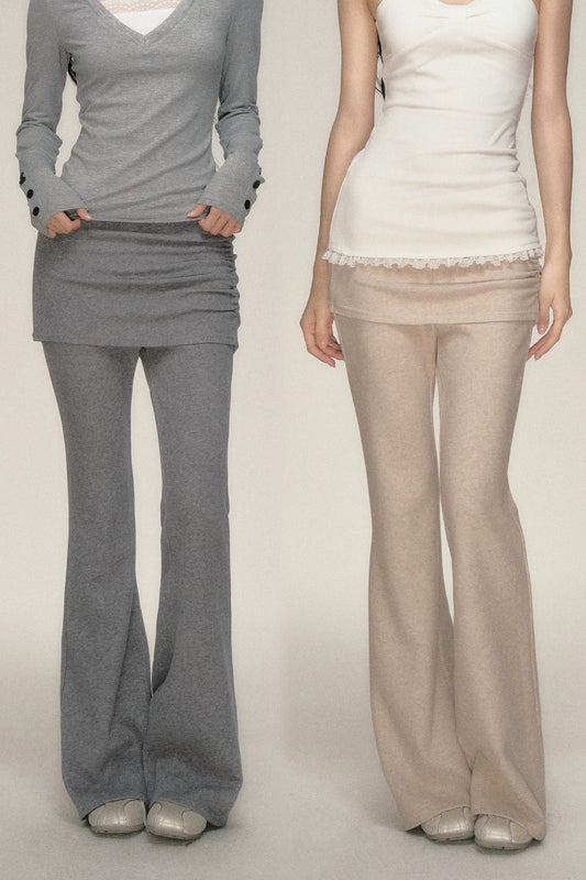 Pantaloni svasati plissettati con risvolto