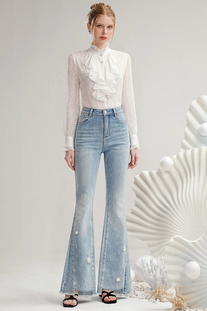 Jeans a vita alta con perline e orlo sfrangiato
